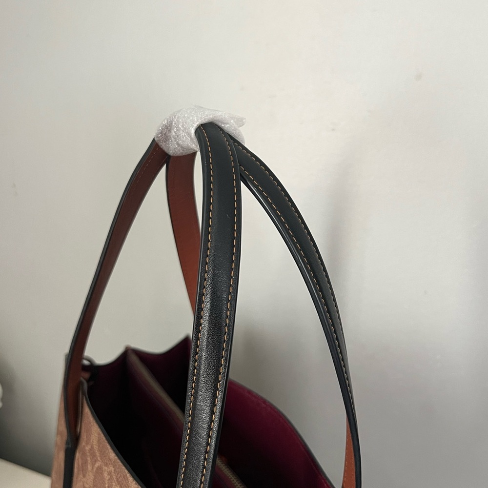 Disney X Coach Charlie Carryall
In Signature Canvas With Patches - Picture 7 of 15